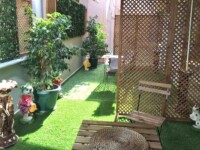 ©Hotel Hugo Altinoluk room with terrace seating plant and figurines ©Hotel Hugo Altinoluk room with terrace seating plant and figurines